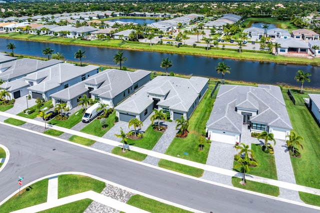 aerial perspective of suburban area featuring a large body of water