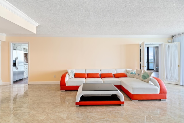 living area featuring baseboards, marble finish floor, a textured ceiling, and crown molding
