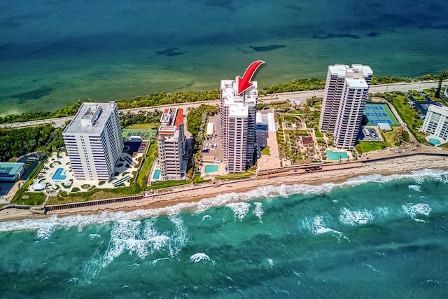 aerial view with a view of the beach and a water view