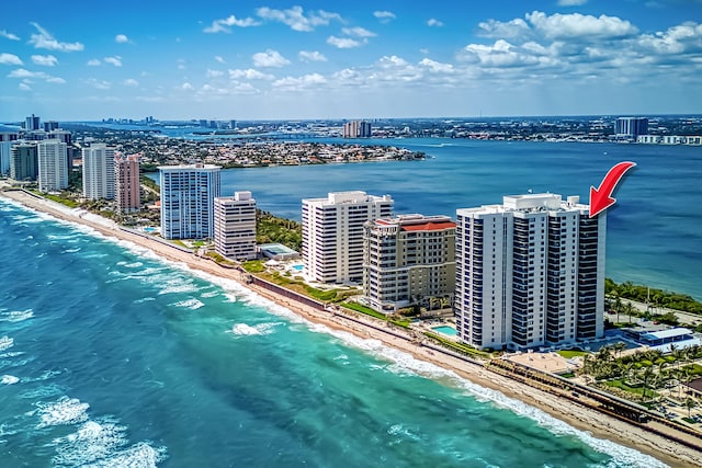aerial view with a view of the beach and a water view