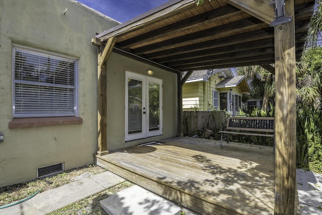 524 S K St, Lake Worth Beach, FL 33460 - deck featuring fence, french doors, and visible vents