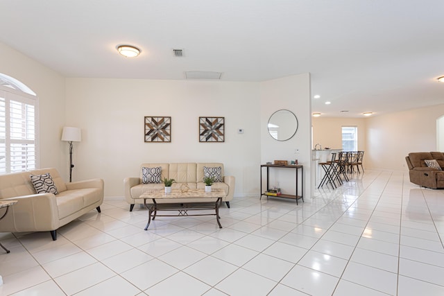 541 NW Pine Sap Pl, Jensen Beach, FL 34957 - living room with light tile patterned flooring and baseboards