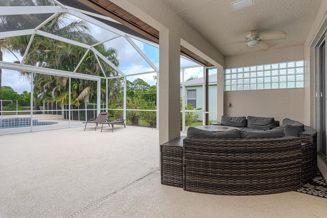 541 NW Pine Sap Pl, Jensen Beach, FL 34957 - view of patio / terrace with ceiling fan, an outdoor pool, and a lanai