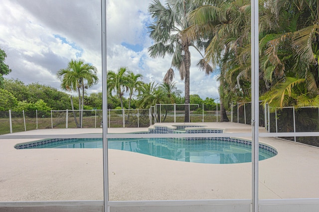541 NW Pine Sap Pl, Jensen Beach, FL 34957 - view of pool with an in-ground hot tub and a patio area