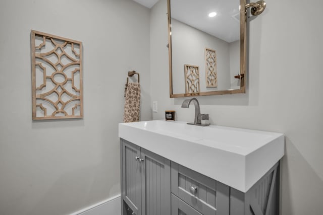 bathroom with vanity and recessed lighting