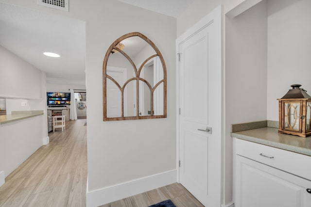 1330 NW 13th St Unit 6, Boca Raton, FL 33486 - hall with light wood-type flooring and baseboards