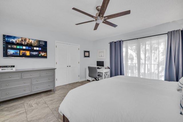 1330 NW 13th St Unit 6, Boca Raton, FL 33486 - bedroom with an office area and a ceiling fan