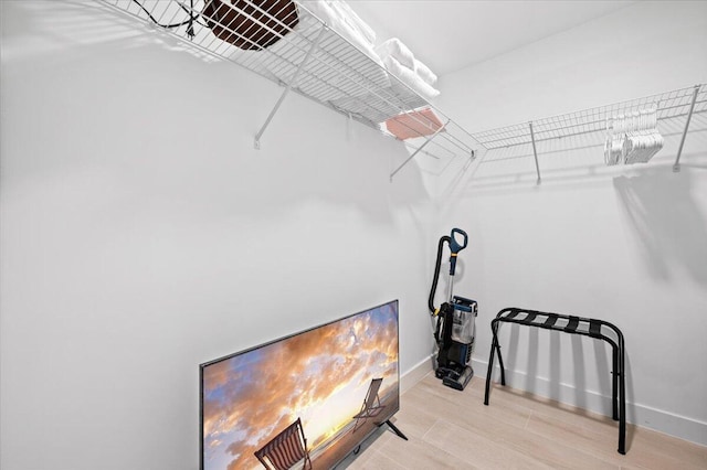 509 Oak Ter, Jupiter, FL 33458 - spacious closet with wood finished floors