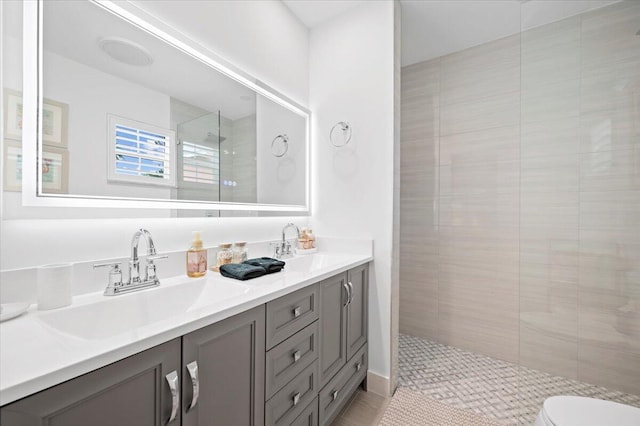 509 Oak Ter, Jupiter, FL 33458 - full bath with walk in shower, a sink, double vanity, and toilet