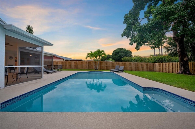509 Oak Ter, Jupiter, FL 33458 - view of pool featuring a fenced backyard, a fenced in pool, a yard, and a patio