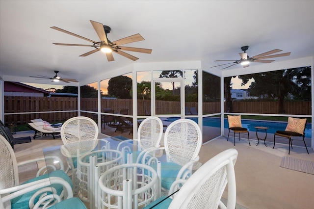 509 Oak Ter, Jupiter, FL 33458 - view of patio / terrace featuring outdoor dining space, a fenced in pool, a fenced backyard, and ceiling fan