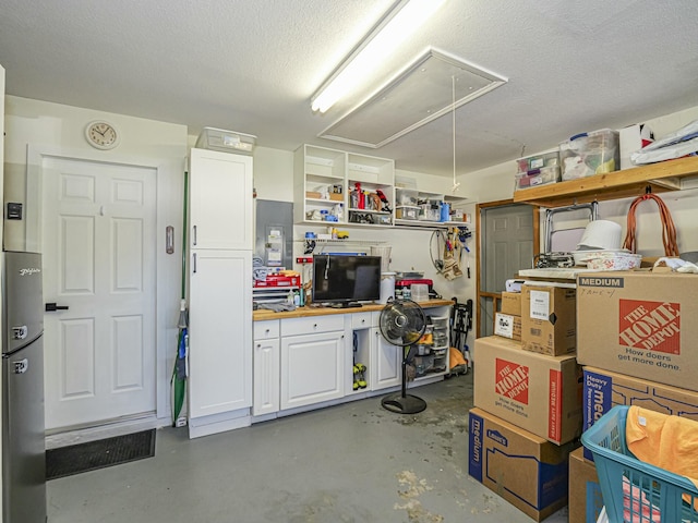 1732 Sunrise Ln, Sebastian, FL 32958 - garage featuring freestanding refrigerator