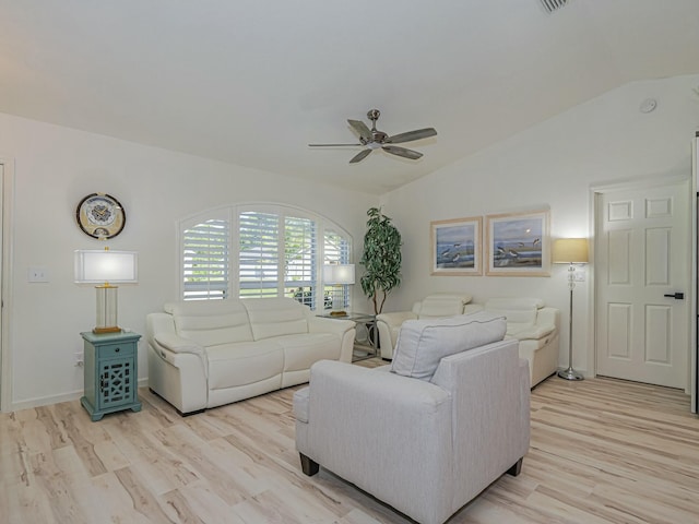 1732 Sunrise Ln, Sebastian, FL 32958 - living room featuring lofted ceiling, a ceiling fan, and light wood-style flooring