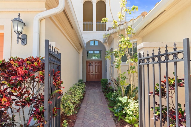 doorway to property with stucco siding