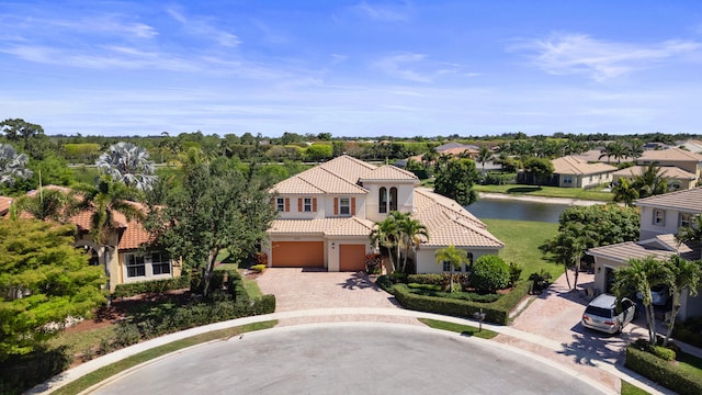 aerial view with a residential view and a water view