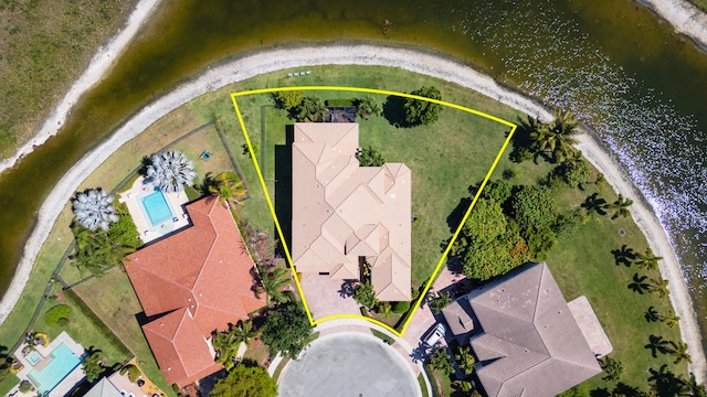 bird's eye view with a water view