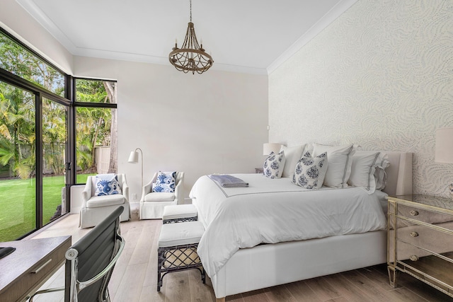 2441 NW 64th St, Boca Raton, FL 33496 - bedroom featuring light wood-style flooring and ornamental molding