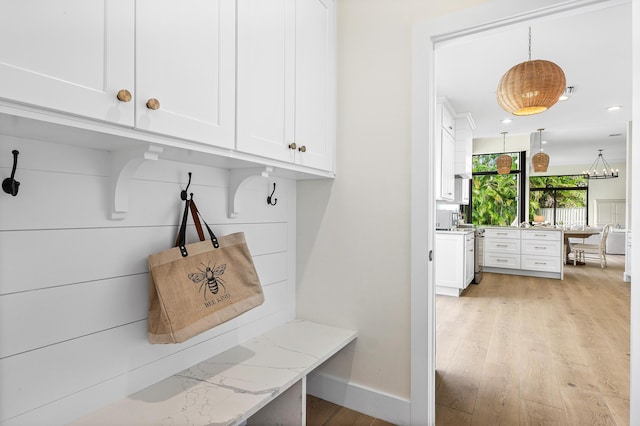 2441 NW 64th St, Boca Raton, FL 33496 - mudroom featuring baseboards, light wood finished floors, and recessed lighting