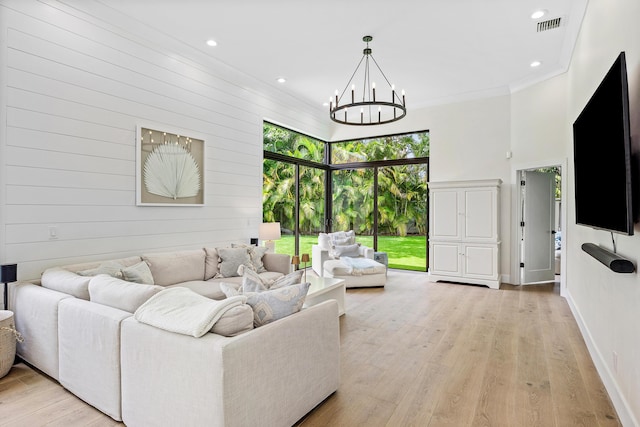 2441 NW 64th St, Boca Raton, FL 33496 - living room featuring an inviting chandelier, light wood-style floors, visible vents, and recessed lighting