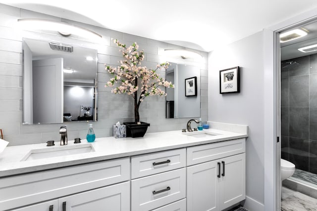 2400 Presidential Way Unit 1803, West Palm Beach, FL 33401 - full bath featuring backsplash, toilet, a shower stall, and double vanity