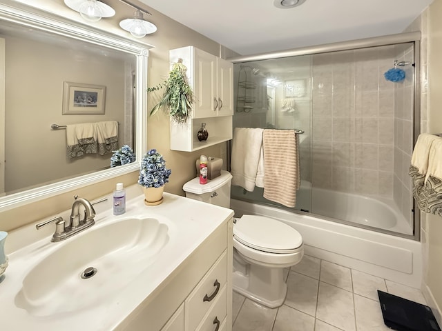 777 S Federal Hwy Unit 209N, Pompano Beach, FL 33062 - full bath featuring vanity, enclosed tub / shower combo, toilet, and tile patterned flooring
