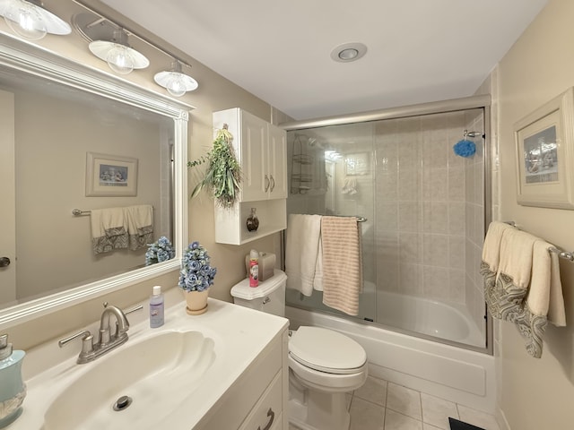 777 S Federal Hwy Unit 209N, Pompano Beach, FL 33062 - bathroom with shower / bath combination with glass door, vanity, toilet, and tile patterned floors
