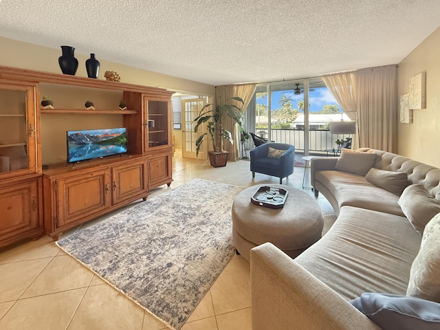 777 S Federal Hwy Unit 209N, Pompano Beach, FL 33062 - living room with light tile patterned floors and a textured ceiling