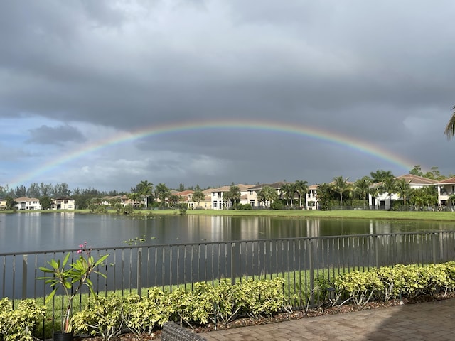 725 Edgebrook Ln, West Palm Beach, FL 33411 - property view of water with fence and a residential view