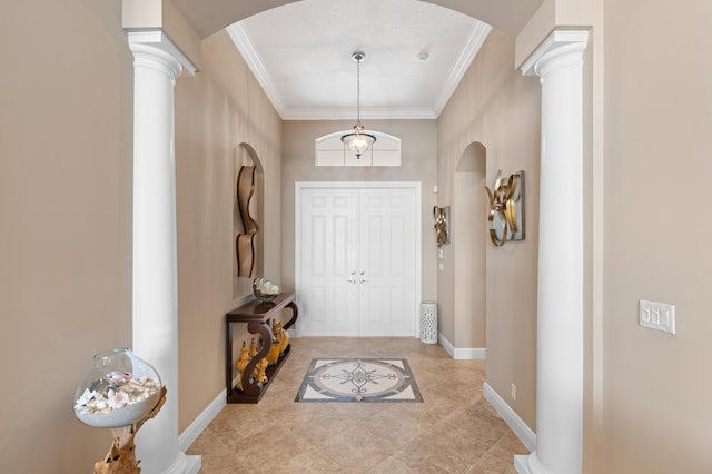 725 Edgebrook Ln, West Palm Beach, FL 33411 - entryway featuring arched walkways, baseboards, decorative columns, and ornamental molding