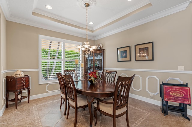 725 Edgebrook Ln, West Palm Beach, FL 33411 - dining room with crown molding, baseboards, a raised ceiling, light tile patterned floors, and a notable chandelier