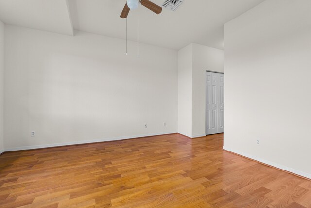 3030 Grandiflora Dr, Greenacres, FL 33467 - spare room with baseboards, a ceiling fan, visible vents, and light wood-style floors
