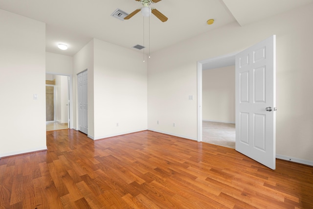3030 Grandiflora Dr, Greenacres, FL 33467 - spare room with ceiling fan, baseboards, visible vents, and light wood-type flooring