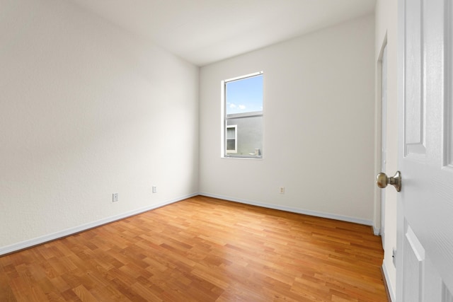 3030 Grandiflora Dr, Greenacres, FL 33467 - unfurnished room featuring light wood-type flooring and baseboards