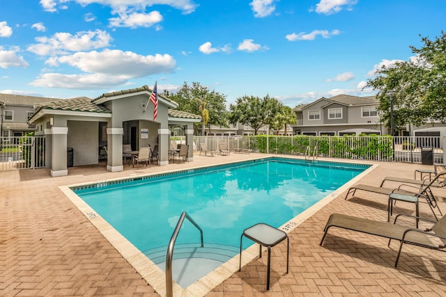 3030 Grandiflora Dr, Greenacres, FL 33467 - pool featuring fence and a patio