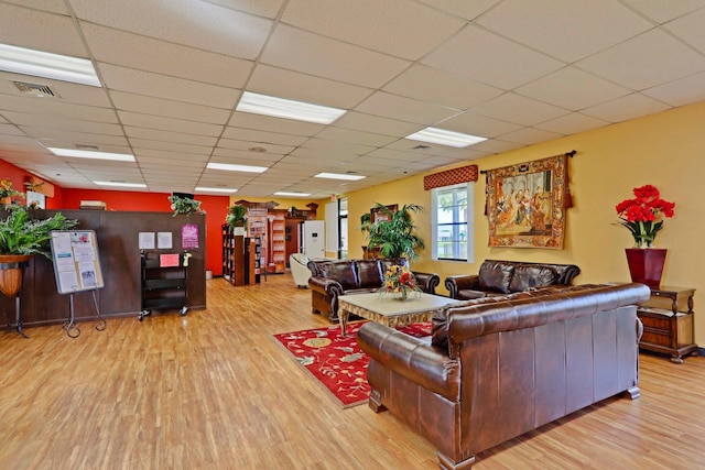 5325 Mariesa Ave, West Palm Beach, FL 33417 - living area featuring wood finished floors and a drop ceiling