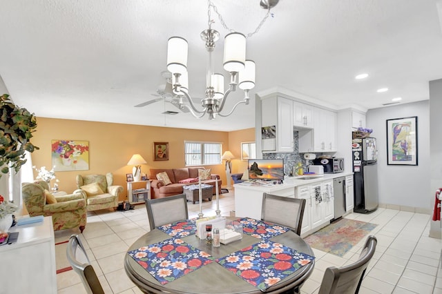 5325 Mariesa Ave, West Palm Beach, FL 33417 - dining area featuring light tile patterned floors, a chandelier, and recessed lighting