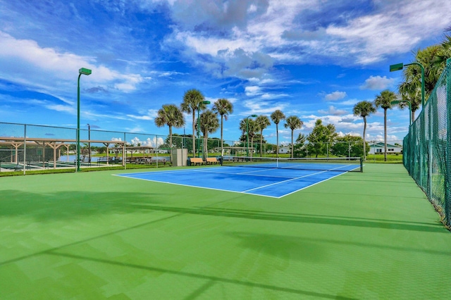 5325 Mariesa Ave, West Palm Beach, FL 33417 - view of tennis court with fence