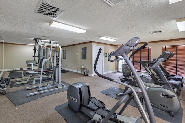 4221 W Mcnab Rd Unit 28, Pompano Beach, FL 33069 - exercise room with visible vents, baseboards, and ornamental molding