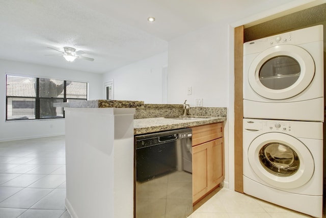 4221 W Mcnab Rd Unit 28, Pompano Beach, FL 33069 - clothes washing area featuring stacked washer / drying machine, ceiling fan, a sink, and light tile patterned floors