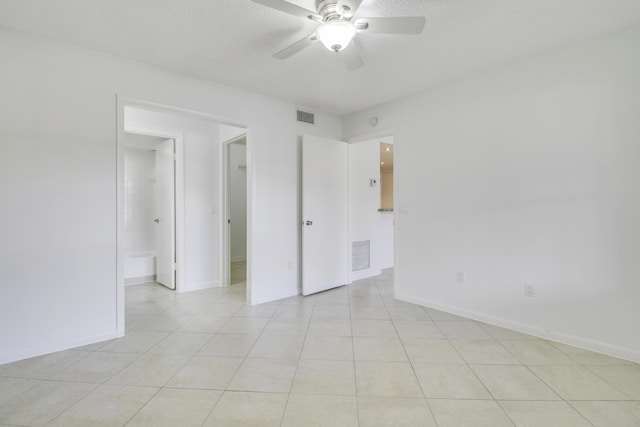 4221 W Mcnab Rd Unit 28, Pompano Beach, FL 33069 - empty room featuring ceiling fan, baseboards, visible vents, and light tile patterned floors
