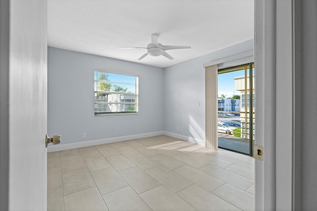 221 Normandy, Delray Beach, FL 33484 - empty room featuring ceiling fan, baseboards, and light tile patterned floors