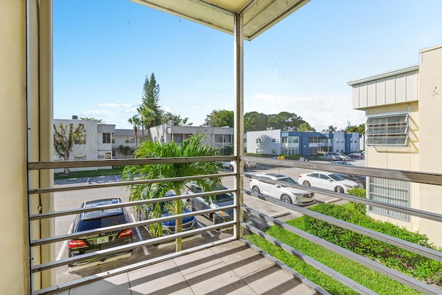 balcony featuring a residential view