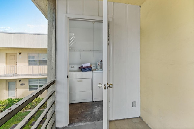 interior space featuring separate washer and dryer and laundry area