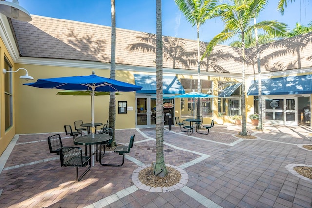 exterior space featuring french doors and outdoor dining space