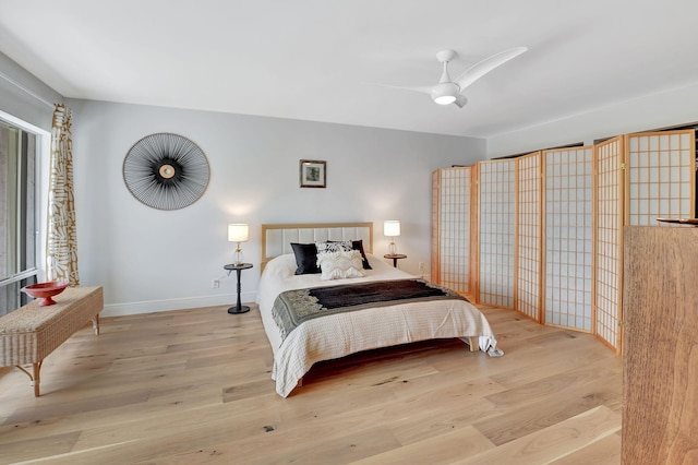 149 NW 70th St Unit 106C, Boca Raton, FL 33487 - bedroom with hardwood / wood-style flooring and a ceiling fan
