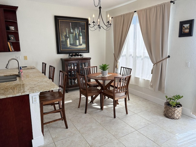 dining space with baseboards, light tile patterned floors, and a notable chandelier