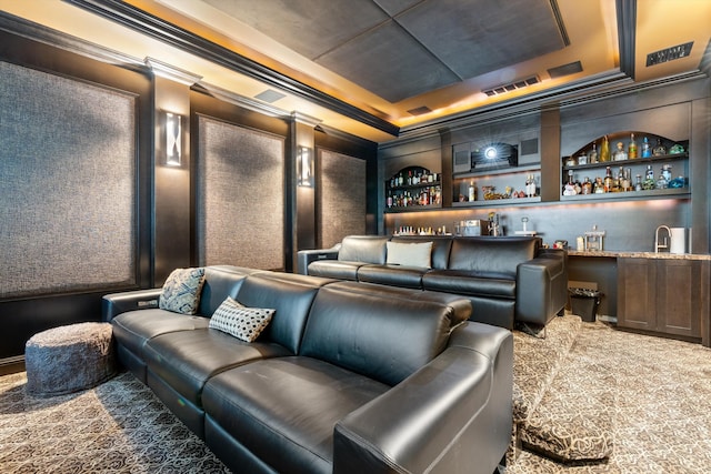 10343 S Barnsley Dr, Parkland, FL 33076 - carpeted cinema featuring wet bar, crown molding, and a tray ceiling