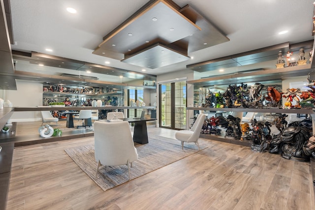 10343 S Barnsley Dr, Parkland, FL 33076 - dining space featuring a bar, wood finished floors, and recessed lighting