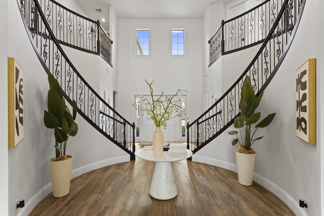 10343 S Barnsley Dr, Parkland, FL 33076 - entrance foyer featuring stairs, wood finished floors, and a high ceiling