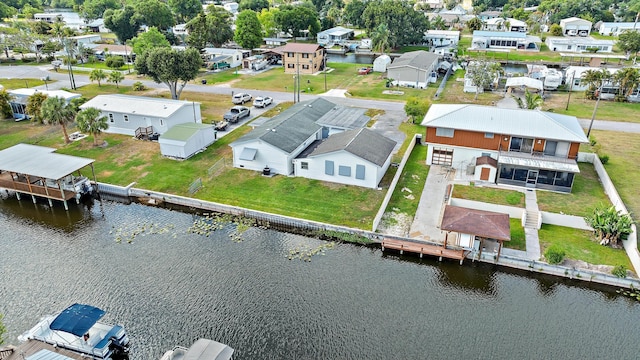 3014 SE 25th St, Okeechobee, FL 34974 - drone / aerial view featuring a residential view and a water view